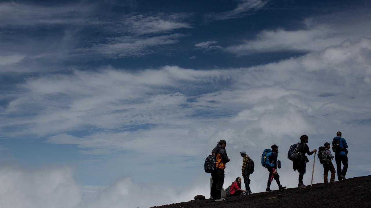 Fewer tourists climbed the mountain this year after Japanese authorities introduced measures to fight overtourism. Picture: Chris McGrath/Getty Images