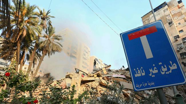 Debris of destroyed buildings piled up behind a dead end sign at Beirut's southern suburb Haret Hreik neighbourhood. Picture: AFP.