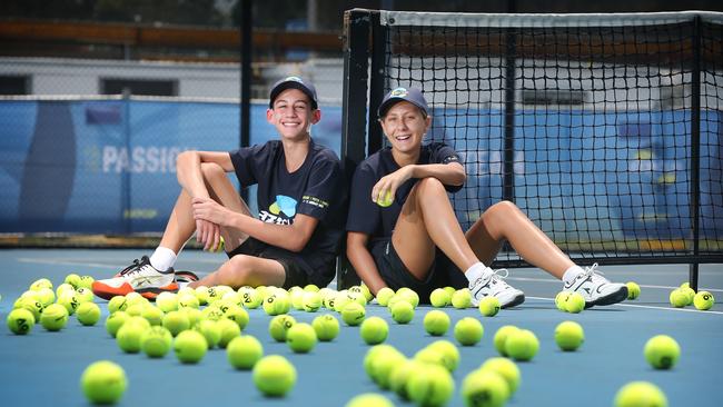 Ball kids Orlando Manciameli (14) and Zoe Duchet-Catherine (16) at the Sydney tennis centre. Picture: Richard Dobson