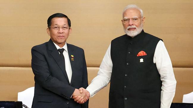 Indian Prime Minister Narendra Modi, right, with Myanmar's military chief Min Aung Hlaing. Picture: AFP