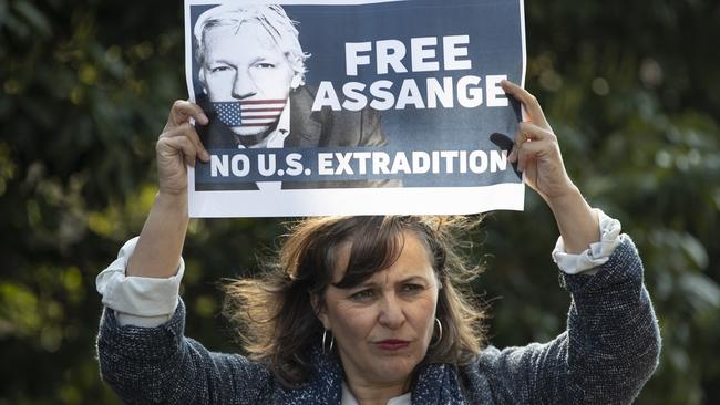 Spain’s Miranda Paz holds a sign while speaking to members of the media outside Belmarsh Prison about Julian Assange. Picture: Getty