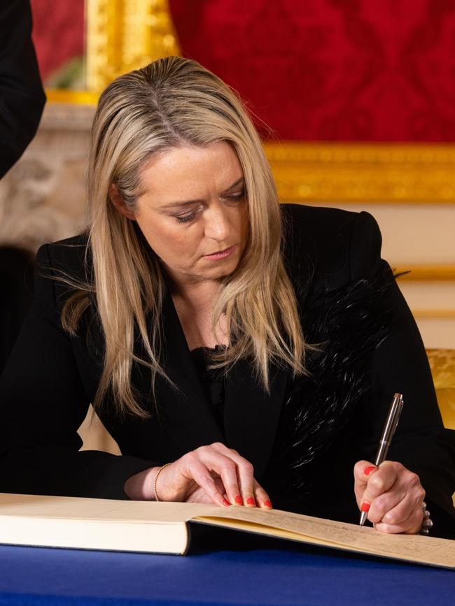 Jodie Haydon wore the Carla Zampatti Florence Feather Jacket while signing the book of condolence at Lancaster House following the Queen’s death. Picture: David Parry/WPA/Getty