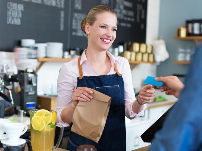 Waitress serving customer at the coffee shop