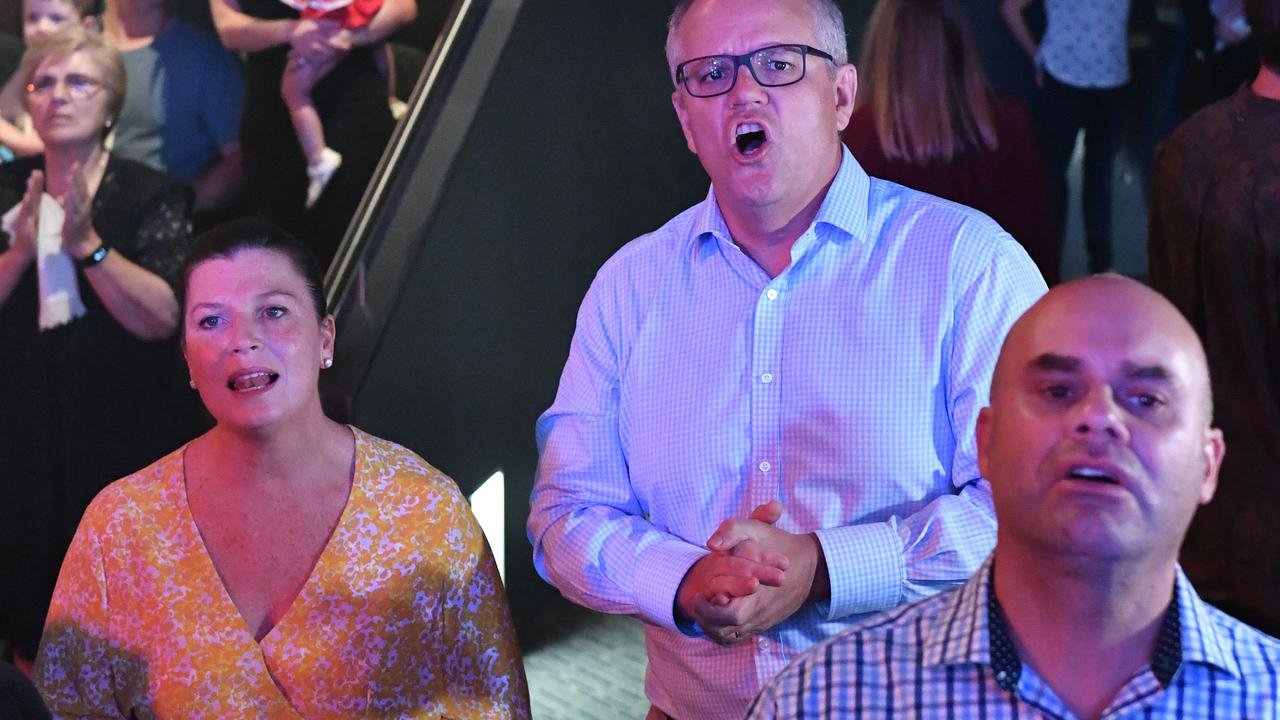 Prime Minister Scott Morrison and his wife Jenny singing. Picture: AAP 