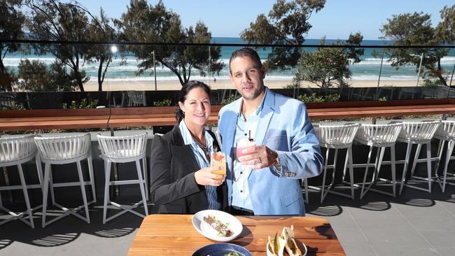 Owners Liz and Justin Allie toast to the Coast. Picture: Glenn Hampson