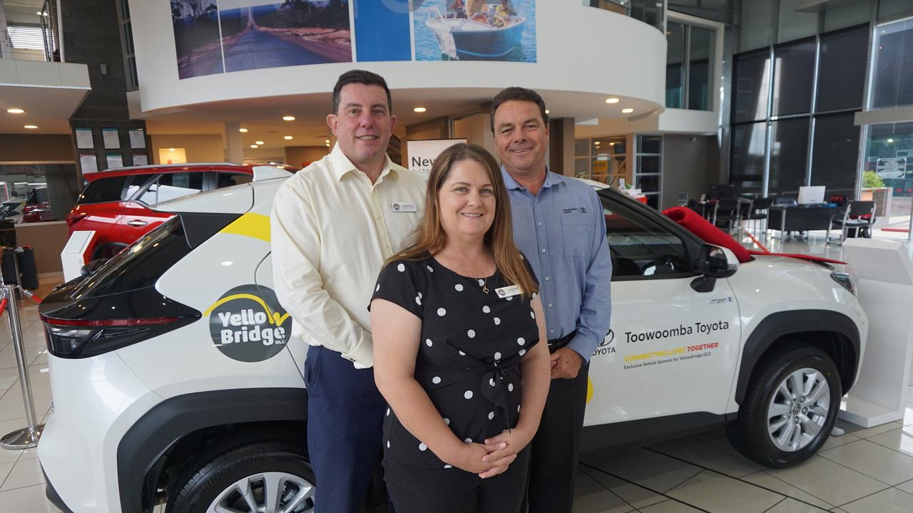 NEW WHIP: A Toowoomba car dealership has generously re-signed as the exclusive vehicle sponsor for YellowBridge Queensland, an organisation supporting Toowoomba’s most vulnerable youth. At the car handover (from left) YellowBridge QLD CEO Adrian Bonica and Youth Services Program Manager Donita Bellette collect their new Toyota Yaris Cross as part of an ongoing Exclusive Vehicle Sponsorship partnership with Brett Motton from Toowoomba Toyota.