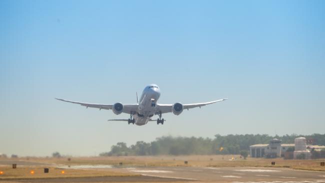 Qantas flight 111 leaves Darwin International Airport on Friday on a mercy mission to bring stranded Australians home from COVID-ravaged India. Picture: Che Chorley