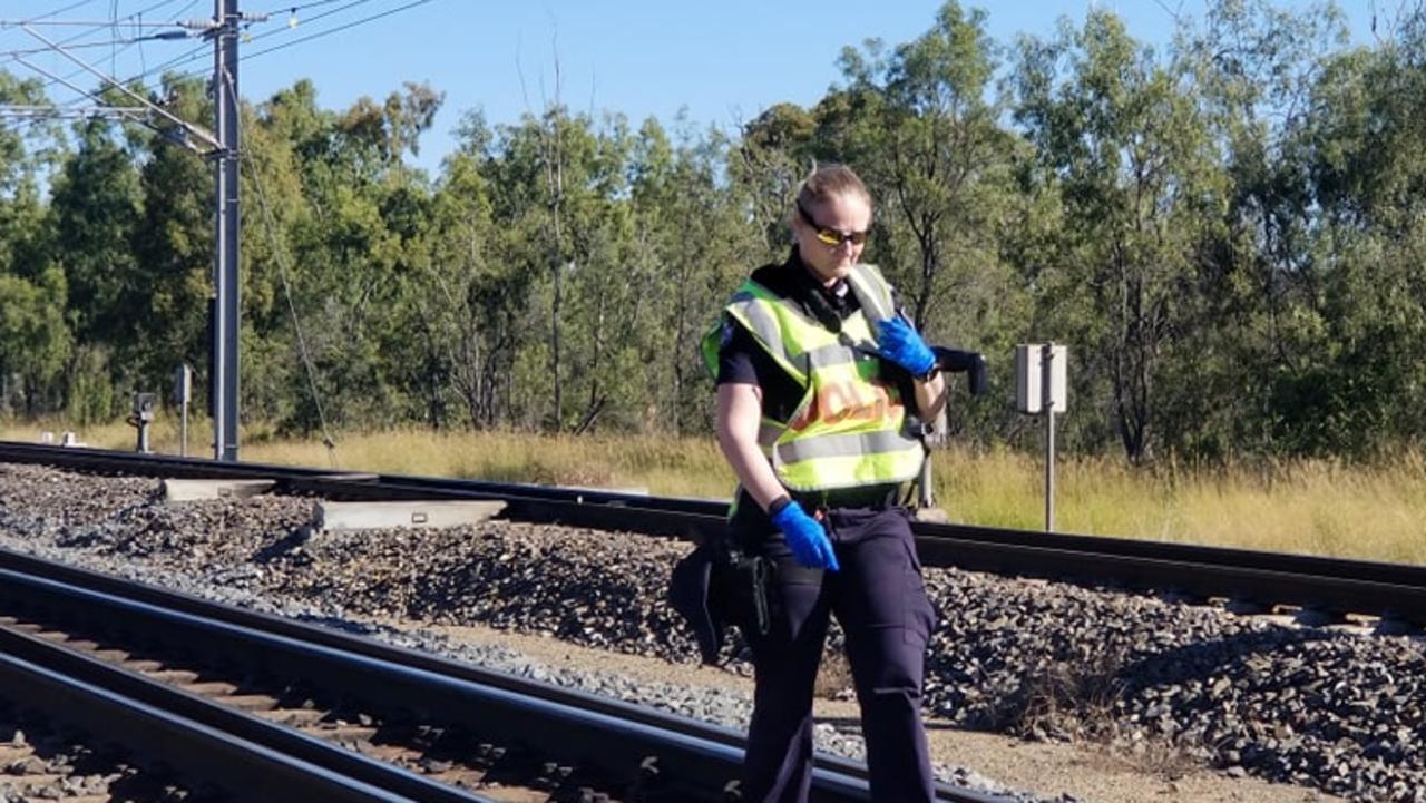 Emergency services at the scene of a train collision at Westwood, west of Rockhampton, on June 18, 2021.