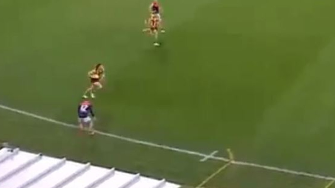 Lachie Hunter ran up to the boundary line from the interchange bench in an apparent attempt to put off a Hawthorn opponent as he ran down the wing.