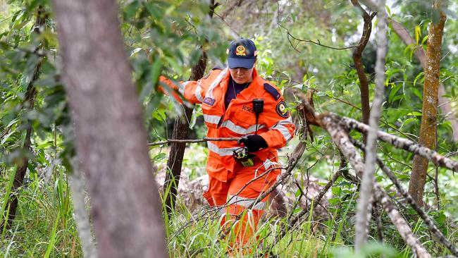 SES sift through dense bushland for Anthony Roper. Picture: John Gass