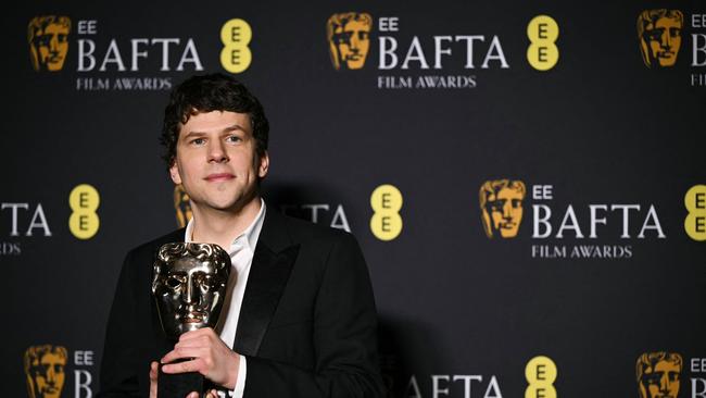 US actor and screenwriter Jesse Eisenberg poses with the award for Best original screenplay for 
