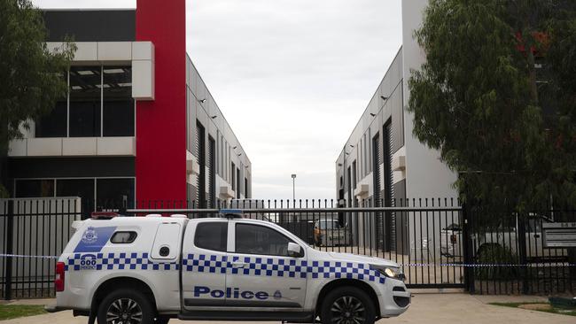 Police investigate after the fire at the Finks clubhouse. Picture: Sarah Matray