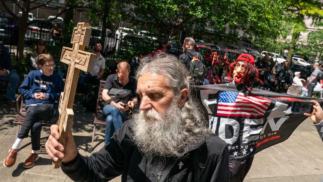 Trump supporters congregate at Collect Pond Park across from Manhattan Criminal Court. An ABC poll this month found 80 per cent of Trump supporters would stick with him after a guilty verdict. Picture: David Dee Delgado, via Getty Images