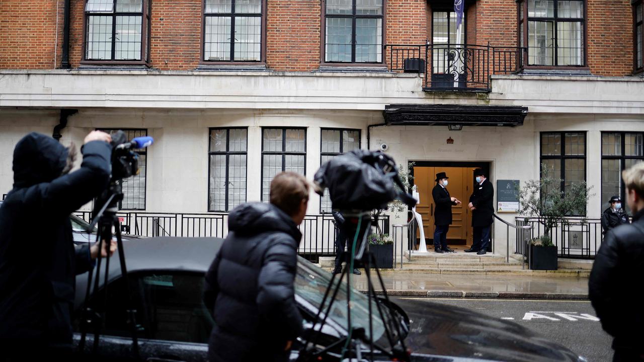Doormen stand at the entrance to King Edward VII hospital in central London where Britain's Prince Philip was admitted on February 17, 2021. Picture: Tolga Akmen / AFP