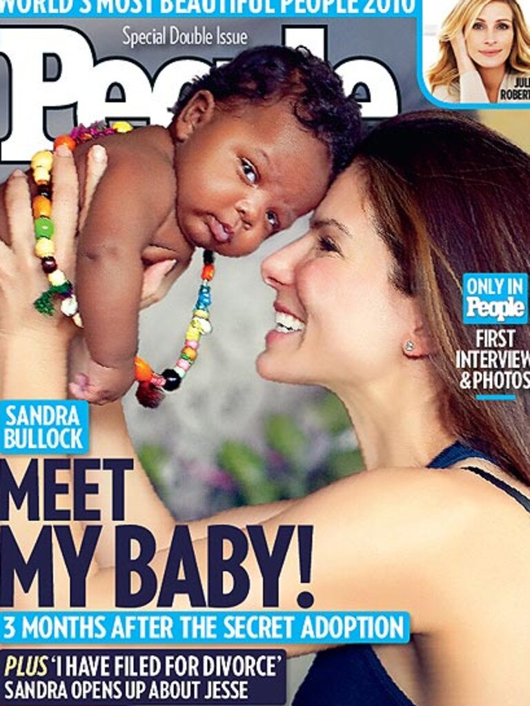 Sandra Bullock with her adopted son Louis on the cover of 'People' magazine in 2010.