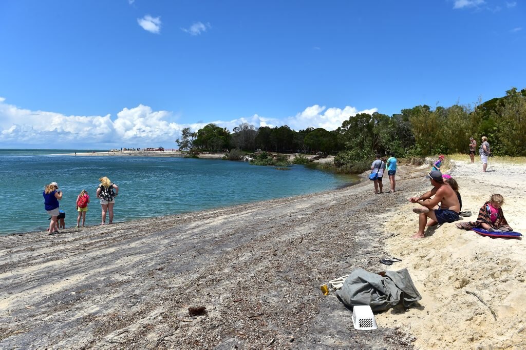 A large sink hole has swallowed a large chunk of the camping area on Inskip Point, taking with it a caravan, camper trailer and one vehicle. Photo: Che Chapman / Sunshine Coast Daily. Picture: Che Chapman