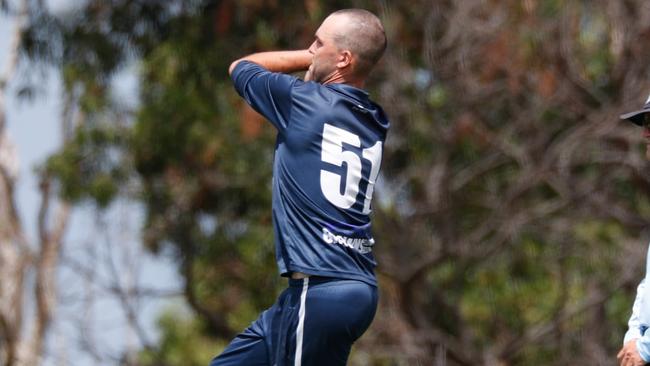 Ryan Smith sends one down for the Dogs. Picture: Field of View Sports Photography