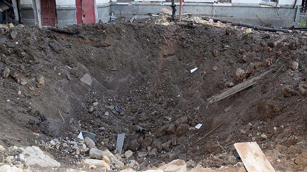 A crater after shelling in Mykolaiv, amid the Russian invasion of Ukraine. Picture: UKRAINIAN EMERGENCY SERVICE/AFP