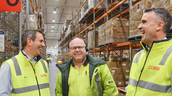 Federal Treasurer Jim Chalmers and South Australian Premier Peter Malinauskas (right) at the Coles Distribution Centre in Edinburgh, north of Adelaide. Picture: NCA NewsWire / Brenton Edwards