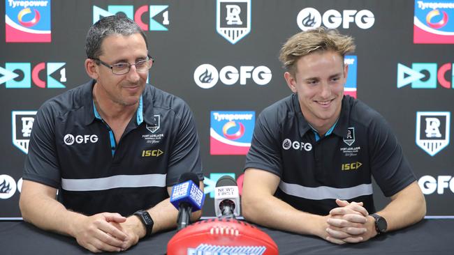 Jackson Mead, right with dad Darren at Alberton Oval. Picture: Russell Millard