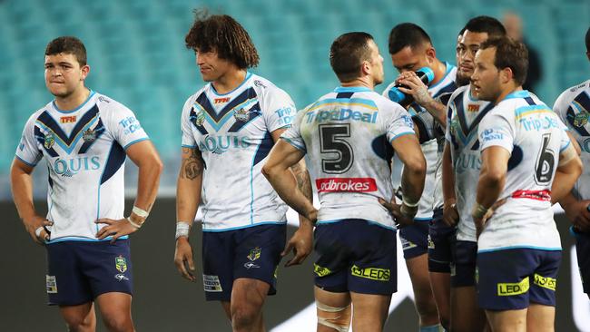 Dejected Gold Coast Titans during NRL match Parramatta Eels v Gold Coast Titans at ANZ Stadium. Picture. Phil Hillyard