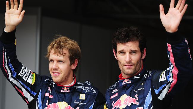 Webber (right) with former racing teammate Sebastian Vettel, Red Bull’s “favourite son”.