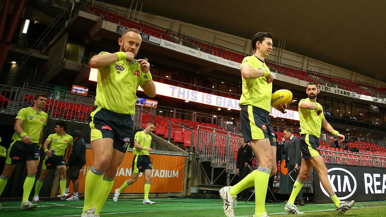 Umpires are believed to be so frightened of backlash from angry gamblers, they’ve been checking stats on their phones in contravention of AFL rules. Picture: AAP Image/Mark Nolan