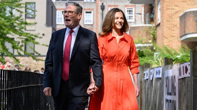 Labour Party leader Keir Starmer and his wife Victoria Starmer arrive at a polling station to place their votes in the 2024 General Election. Picture: Getty Images