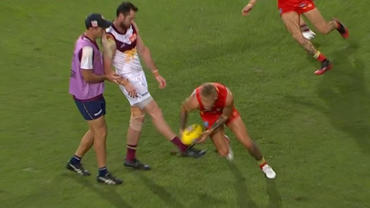 AFL news 2021: Brisbane Lions vs Gold Coast Suns, Darcy Gardiner injury,  tries to kick footy, funny, reaction, video