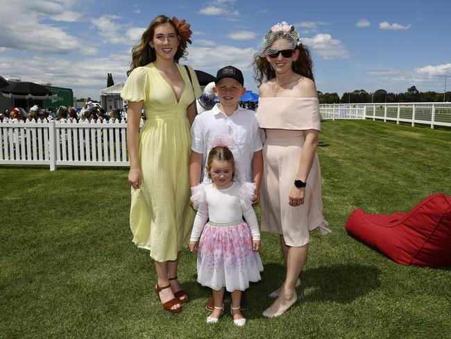 Ladbrokes Sale Cup. Racegoers are pictured attending Cup Day horse races at Sale Turf Club, Sunday 27th October 2024. Oakley (bottom), Tristan (middle) and Phoenix Muir left and Kerrie Muir. Picture: Andrew Batsch