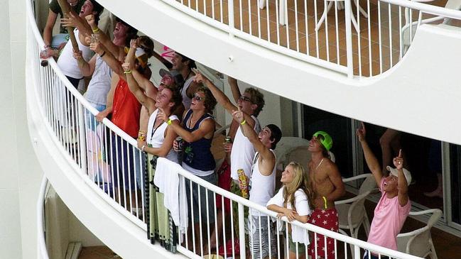 A packed balcony celebrating in November 2003.