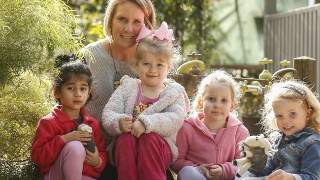 Teacher Rachel Burke with Alisha, Alexandra, Molly and Maya. Picture: Valeriu Campan