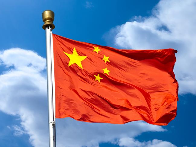 Chinese flag in beijing tiananmen square.