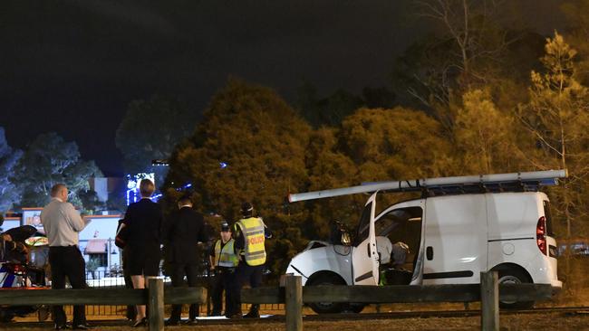 A van collided with two police officers while they were preparing a random breath-testing station at Leumeah. Picture: Gordon McComiskie