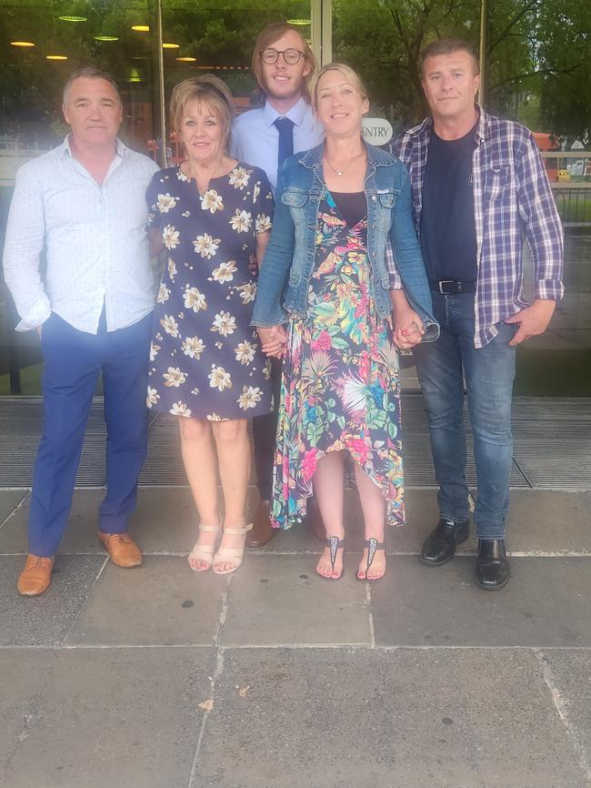 Kylie Bailey (second from right) with partner, Darren Williams, son, Jayden Bailey, mother Ann Brant and Ms Brant’s partner, Danny Powell outside the District Court after Brant’s guilty verdict. Photo: Lucy Rutherford