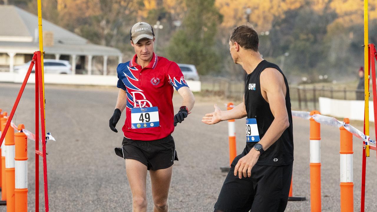 First to finish the first lap is Lost in Pace team member Matthew McNamara as he hands over to Pieter Van Der Kooij. Picture: Kevin Farmer