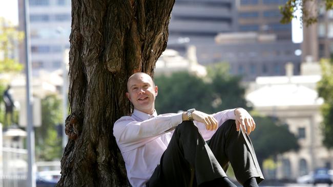 Graham Allcott relaxing in Victoria Square, all part of having a work/life balance to help be productive. Picture: Kelly Barnes