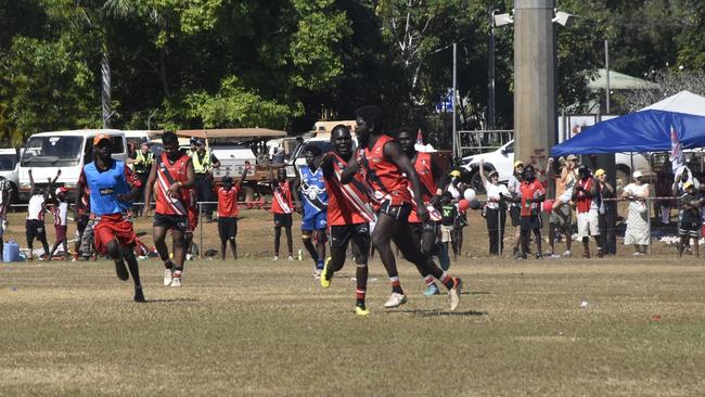 Players in action during the Tiwi Island Football League grand final between Tuyu Buffaloes and Pumarali Thunder. Picture: Max Hatzoglou