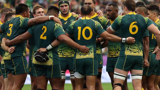 OITA, JAPAN - OCTOBER 05: Australian players huddle prior to the Rugby World Cup 2019 Group D game between Australia and Uruguay at Oita Stadium on October 05, 2019 in Oita, Japan. (Photo by Dan Mullan/Getty Images)