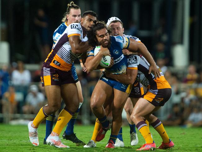 Isaiah Papali'i busts through Brisbane defence. Picture: Che Chorley