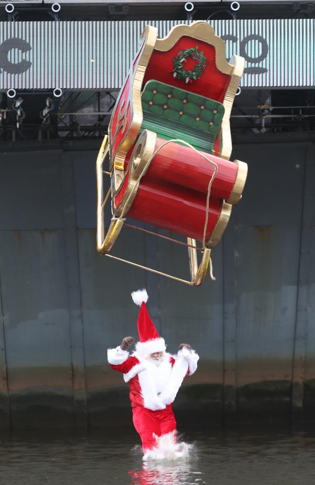 A big splash for the big jolly man in red. Picture: David Crosling