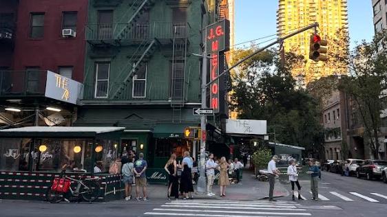 Supplied images of JG Melons Bar in New York which is a popular venue on a Monday night. .