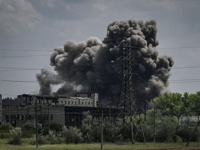 Smoke and dirt ascends after a strike at a factory in the city of Soledar at the eastern Ukranian region of Donbas. Picture: AFP