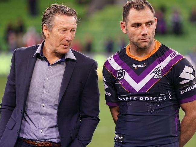 Craig Bellamy, coach of the Melbourne Storm and Cameron Smith talk during the Round 25 NRL match between the Melbourne Storm and the North Queensland Cowboys at AAMI Park in Melbourne, Friday, September 6, 2019. (AAP Image/Scott Barbour) NO ARCHIVING, EDITORIAL USE ONLY