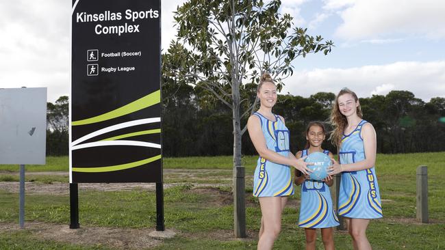 Netball players Ellie Carlson, 20, Ziahn Malopito, 10, and Amanada Mawston, 17, of North Lakes Blues Netball Club on the site of their new courts. PICTURE: AAP/Regi Varghese