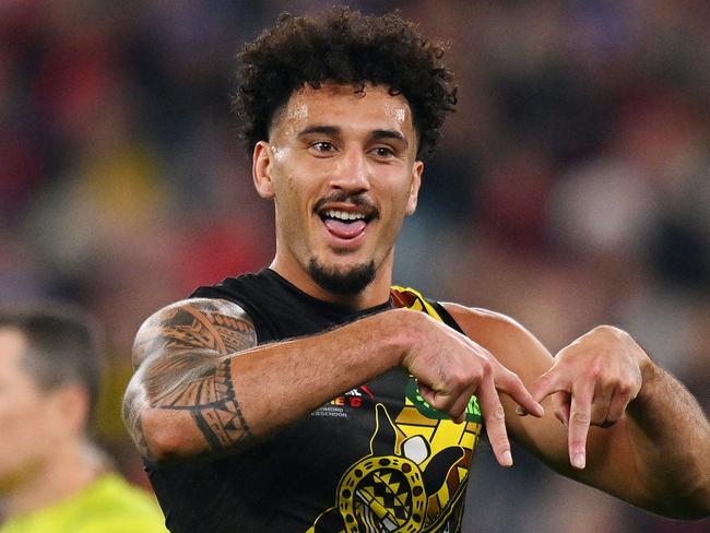 MELBOURNE, AUSTRALIA - MAY 25: Mykelti Lefau of the Tigers celebrates a goal during the round 11 AFL match between Richmond Tigers and Essendon Bombers at Melbourne Cricket Ground, on May 25, 2024, in Melbourne, Australia. (Photo by Morgan Hancock/AFL Photos/via Getty Images)