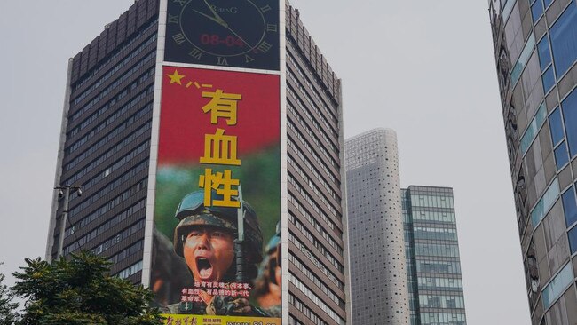 An advertisement in Beijing marks the 95th anniversary of the People's Liberation Army. Picture: EPA/The Times