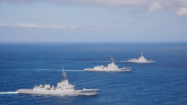 The navy’s Hobart-class destroyers Hobart, Brisbane and Sydney sail in formation off the NSW coast.