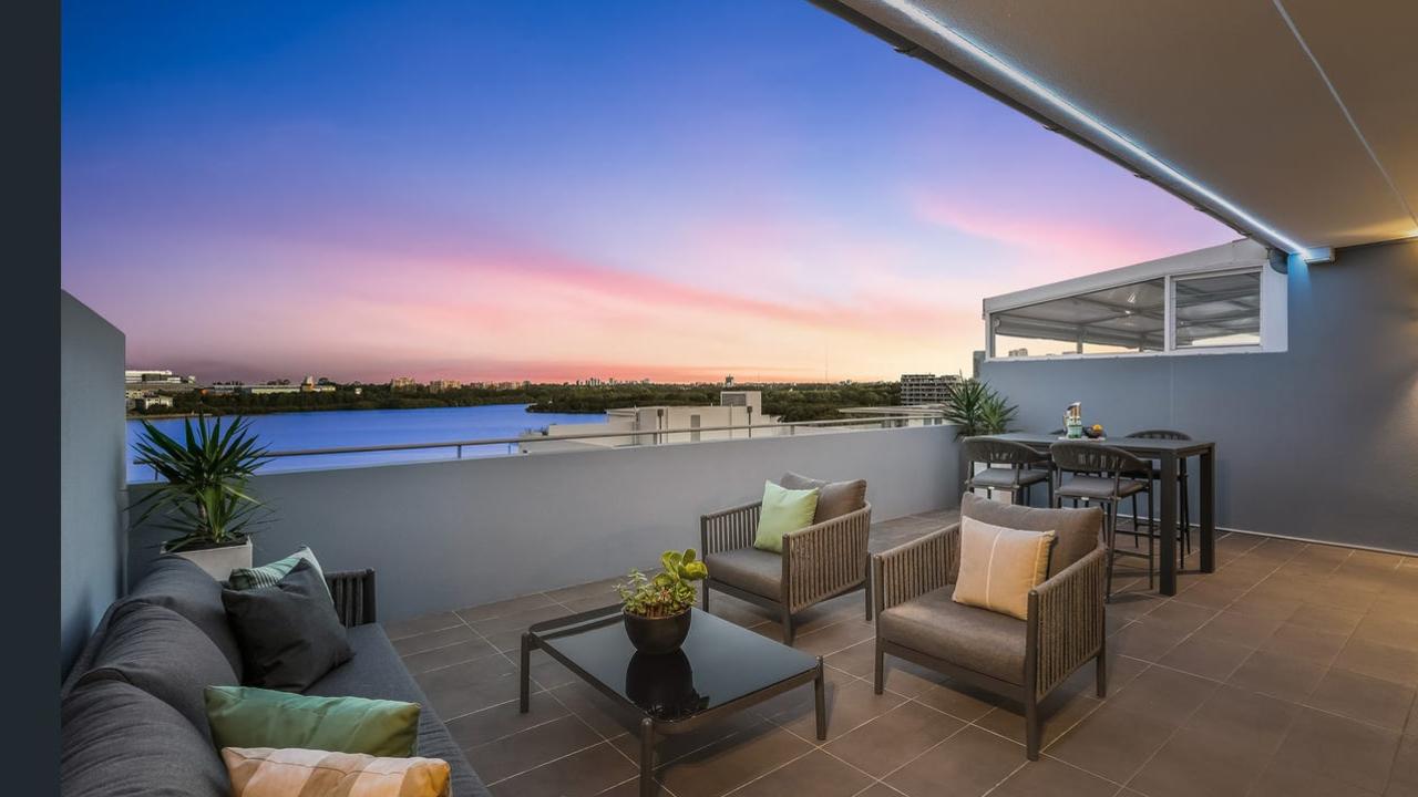 The three-bedroom, two-bathroom apartment has views over the Parramatta River.