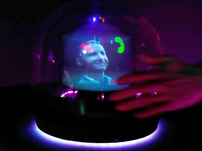 An AI-generated hologram flags an incoming video call at the Deutsche Telekom AG's stand during the Mobile World Congress in Barcelona. Picture: Pau Barrena/AFP